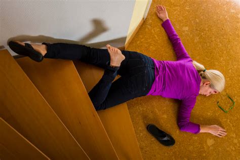 Woman Falling Down Stairs Stock Photos Pictures And Royalty Free Images