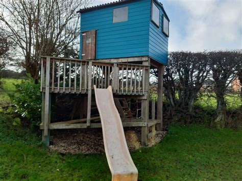 kids Playhouse / Clubhouse / Treehouse with raised platform & slide ...