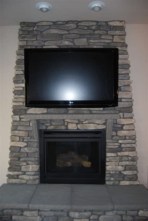 Does anyone know of a mount or. This TV was mounted on a stone surface above the fireplace ...