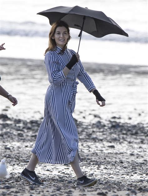 nigella lawson covers up on a sunny day at the beach in auckland celebmafia
