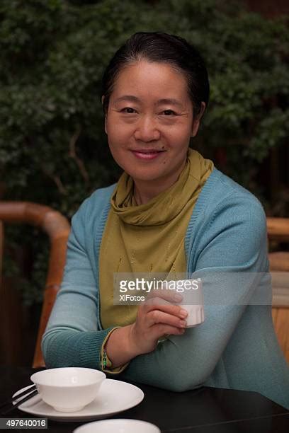 Mature Asian Women Fotos Photos And Premium High Res Pictures Getty Images