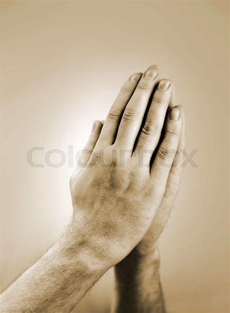 Sepia Toned Photograph Of Hand Clasped In Prayer Stock Image Colourbox