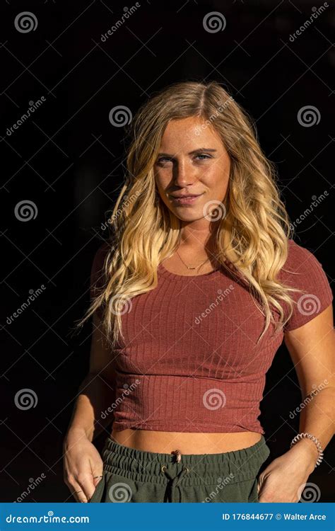 A Lovely Blonde Risque Model Poses In A Parking Deck On An Autumn Day Stock Image Image Of
