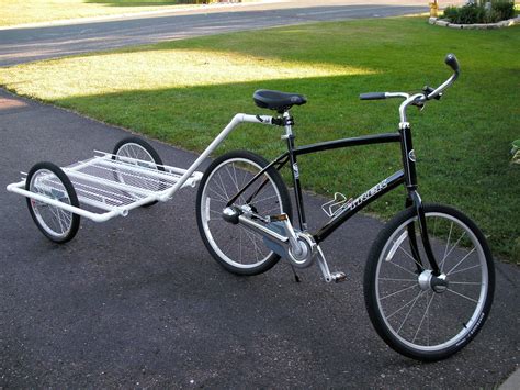 A diy bike trailer uses the same ball hitch as other models, allowing the trailer to move in response to bumps in the road, while keeping a spacer between bike and trailer. PVC Bike Trailer - Instructables