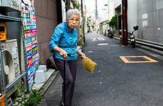 old japanese tokyo stares side street woman dismissive indiscreet pretty much look