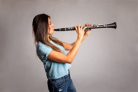 Premium Photo Playing On A Clarinet
