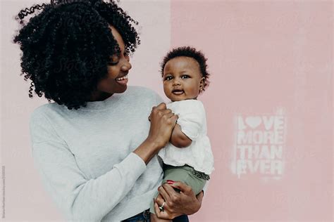 A Happy Black Mom With Her Cute Baby Girl By Briana Morrison African