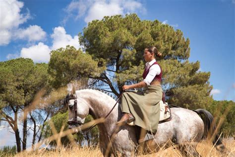 Woman Horsewoman Young And Beautiful Walking With Her Horse In The