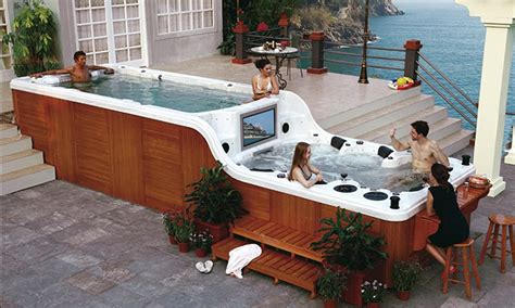 The World S Coolest Hot Tub The Two Tiered Jacuzzi Which Comes With Its Own Bar Flat Screen Tv