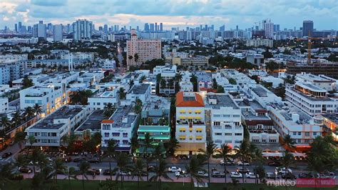 Aerial Panoramic Of Ocean Drive And Miami Downtown At Dusk Royalty