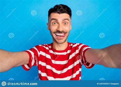 Photo Of Funky Funny Young Happy Man Make Camera Selfie Bite Teeth