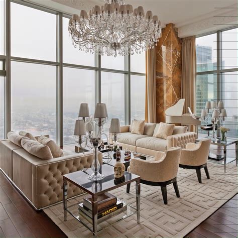 A Living Room Filled With Furniture And A Chandelier