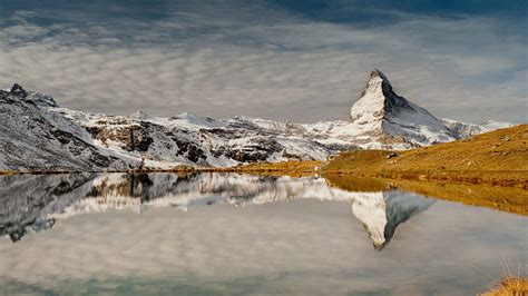 The Matterhorn Reflected In A Lake Reflection Alps Lake Mountains
