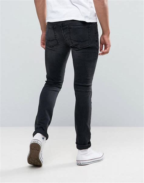 Lyst Asos Super Skinny Jeans With Knee Rips In Dark Grey Wash In Gray