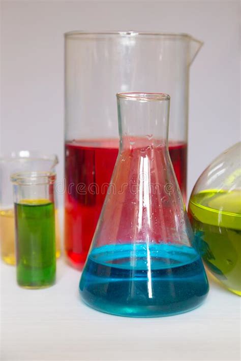 Different Size And Color Chemical Flasks With Colored Chemical