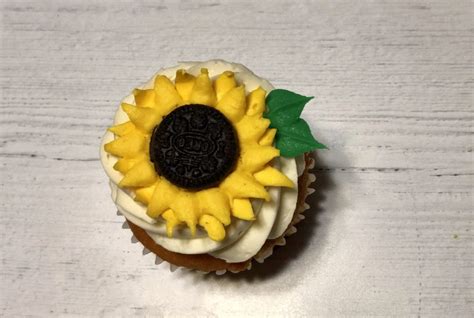 The edible images are printed with edible ink on high quality frosting sheets. Buttercream Oreo Sunflower Cupcakes | #NeverDoneWithFun