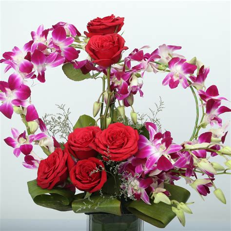 Buysend Rose And Orchid Arrangement Online Ferns N Petals