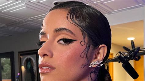 how to recreate camila cabello s razor sharp winged eyeliner look vogue india