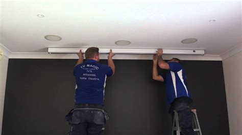 Mounting a projector screen on the ceiling should only be reserved for special cases. The easiest projector screen to install - YouTube