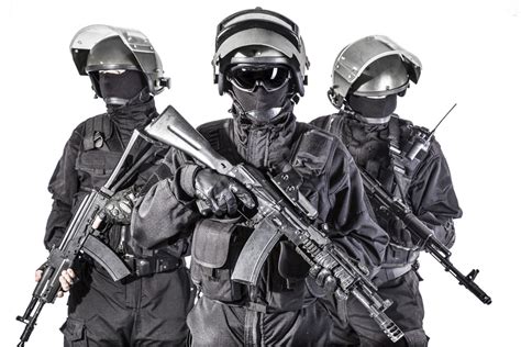 Russian Special Forces Operators In Black Uniform And Bulletproof