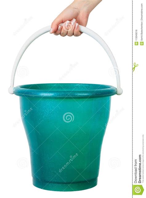 Woman`s Hand Holding A Bucket On An Isolated White Background Stock