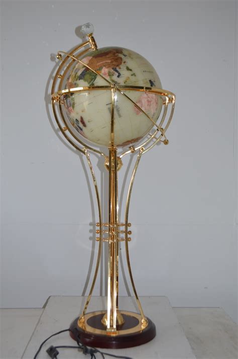 Illuminated White Gold World Globe Rotated By Motor Size 19l X 19w