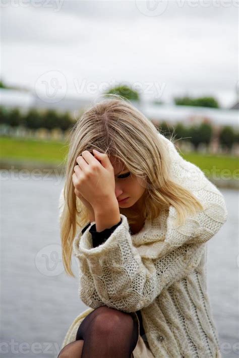 The Girl In Despair And Grief Against River 1718924 Stock Photo At Vecteezy