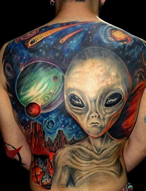 This alien tattoo idea can be applauded for the amount of significant meaning one could think off while putting this thought, of mixing devilish yet fun elements. Alien Tattoo and Meaning - TattoosWin
