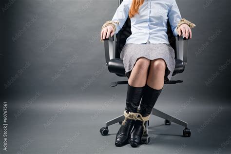 Tied Up Businesswoman In A Chair Stock Photo Adobe Stock