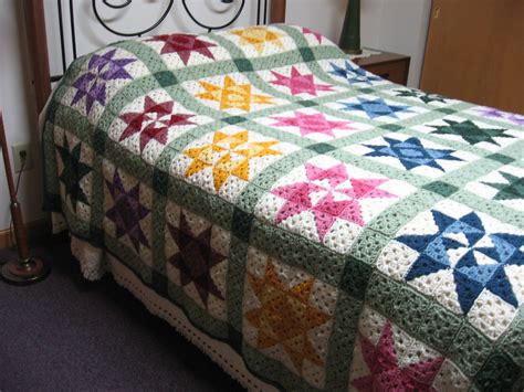 i made this crocheted afghan quilt to use up my left over yarn i crochet using an adaptive