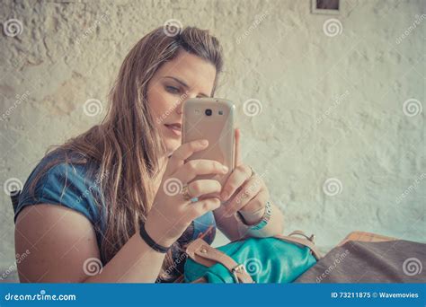 Woman Taking Picture With Her Cell Phone Stock Image Image Of Holding