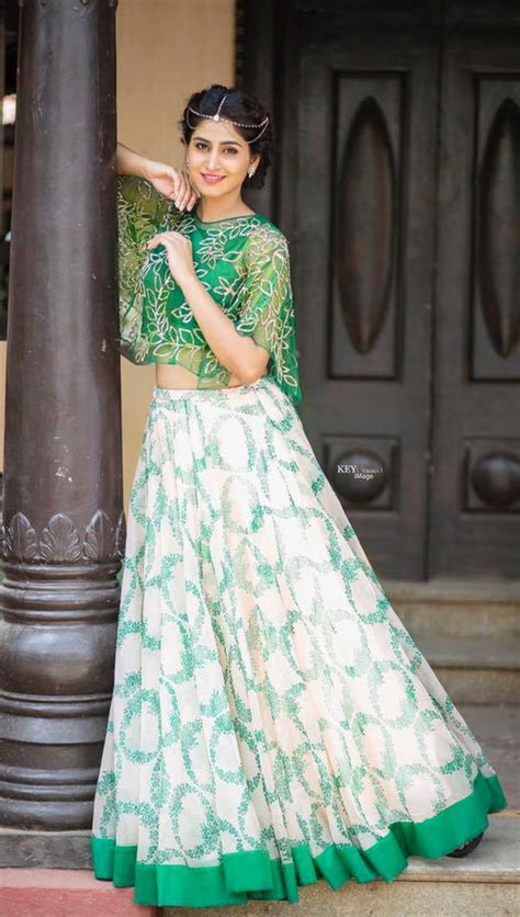 Beautiful Indian Girl Shamili Sounderajan Photo Shoot In Green Lehenga Choli Tolly Boost