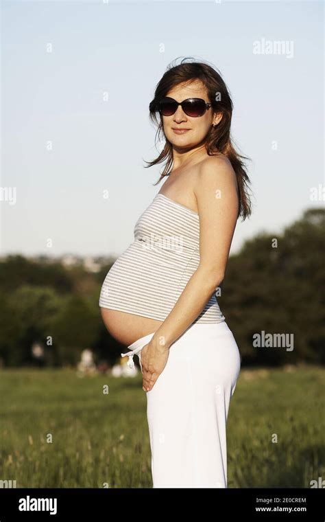 Great Britain England London A Young Pregnant Woman Standing Stock