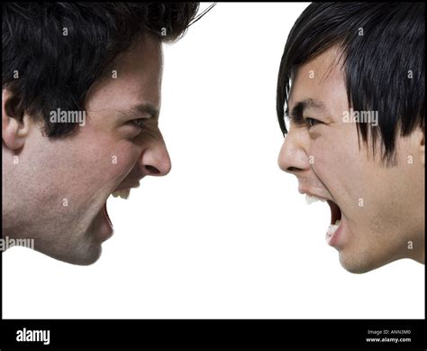 Close Up Of Two Young Men Shouting At Each Other Stock Photo Alamy