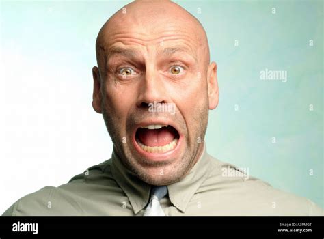 Man with a terrified look on his face Stock Photo ...