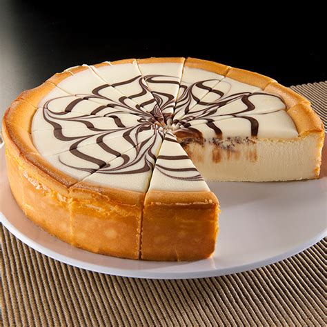 Melt the white chocolate and add to the cream cheese mix. White Chocolate Swirl Cheesecake by GourmetGiftBaskets.com