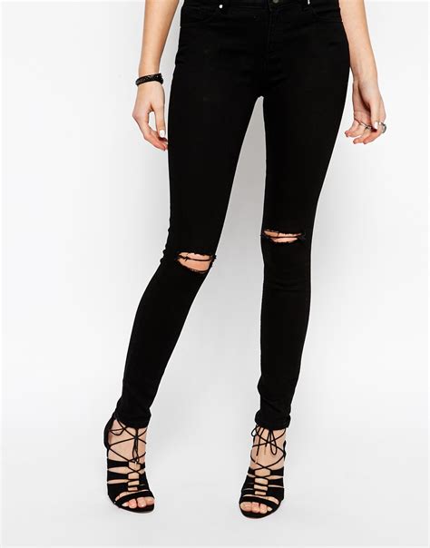 ASOS Lisbon Skinny Mid Rise Jeans In Black With Displaced Knees At Asos Com