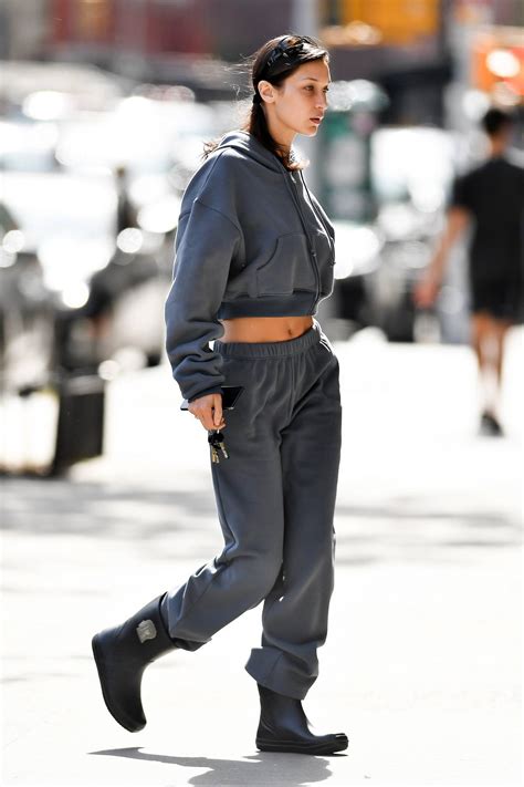Bella Hadid Flashes Her Toned Abs As She Steps Out Wearing A Grey