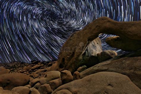 Star Trails In Joshua Tree National Park At The Arch Stock Image