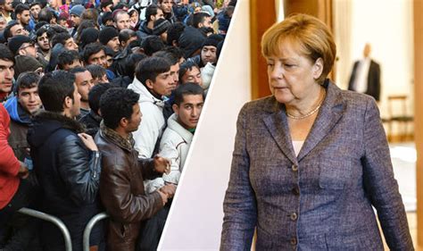 germany expects up to 300 000 migrants to arrive this year admits migration chief world