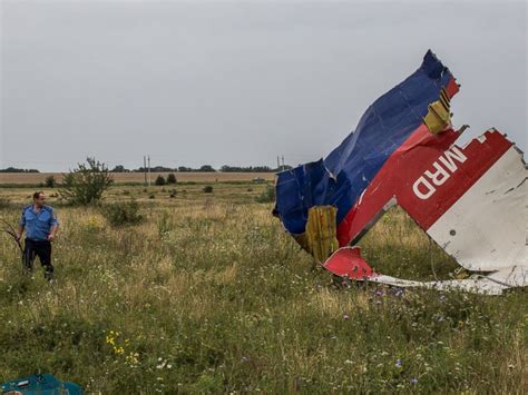 Body Parts Debris Scattered Across Malaysia Airlines Wreckage Site