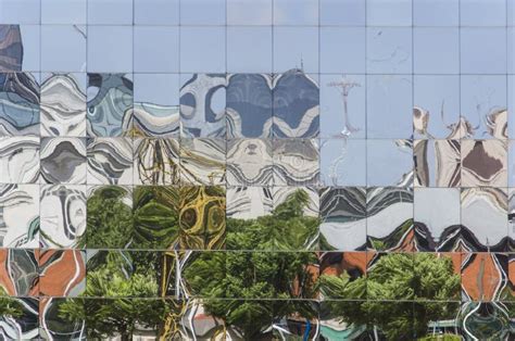 Reflective Wall In Which The Surrounding Constructions Are Reflected