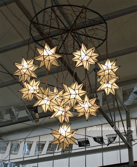 These mexican star light fixtures are designed to create elegant lighting in any room to accent your rustic decor. Frosted glass star chandelier. This picture was taken ...