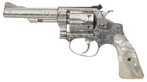 Engraved Smith And Wesson Model 651 Double Action Revolver With Pearl Grips