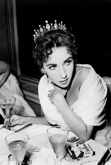 elizabeth taylor with her famous diamond tiara at the cannes film festival cannes france