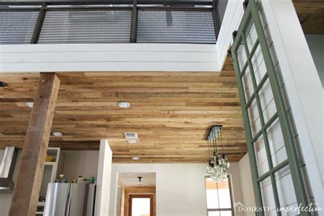 This rustic wood ceiling creates a cozy nook. DIY Reclaimed Wood Ceiling (so cheap, so pretty ...