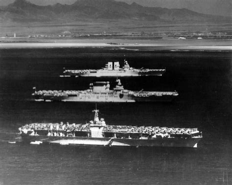 Two Large Ships In The Water Near Each Other
