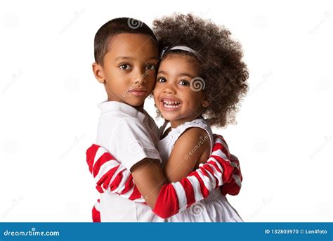 Portrait Of A Preschool African American Siblings Hugging Each Other