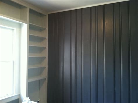 Lightly sand the wood surface. Painted dark wood paneling grey and white shelving. Turned ...