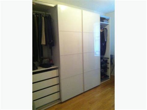Wardrobe with sliding doors, looks very similar to the ikea pax wardrobe. REDUCED PRICE / PAX IKEA Wardrobe (Farvik white glass ...